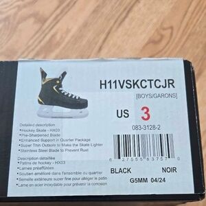 Youth Black Hockey Skates with Yellow Accents